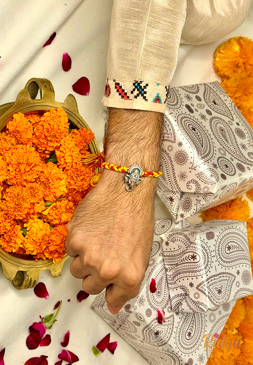 Detailed Carved Ganesha Silver plated Rakhi Cum Pendant