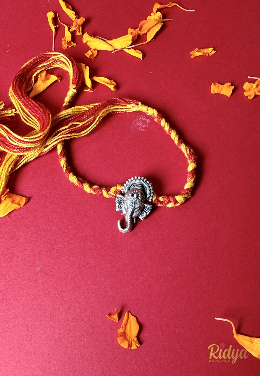 Detailed Carved Ganesha Silver plated Rakhi Cum Pendant