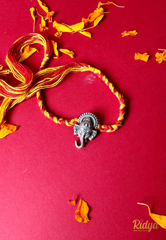 Detailed Carved Ganesha Silver plated Rakhi Cum Pendant